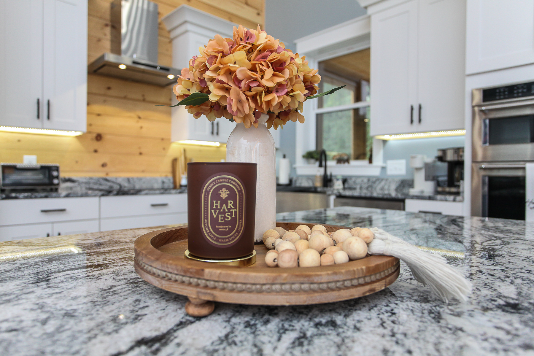 Thoughtful decorative touches add warmth and charm to the kitchen island at Robbin’s Nest on Snowbird Creek.