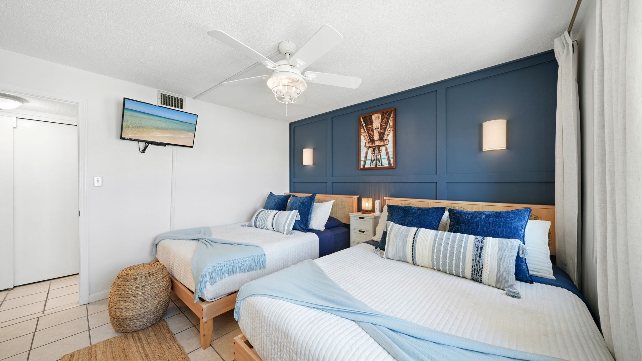 Cozy bedroom with panoramic views of the beach from the window