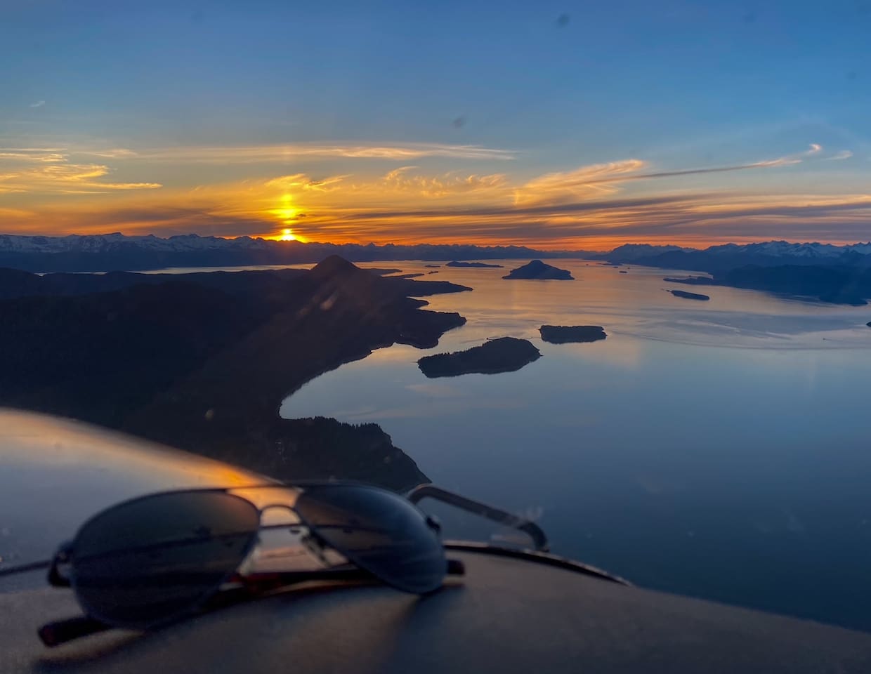 S.E. By sky and water are experiences you will never forget. Sunset over the Chilkat Mountian range just a few miles from the Juneau Airport. 