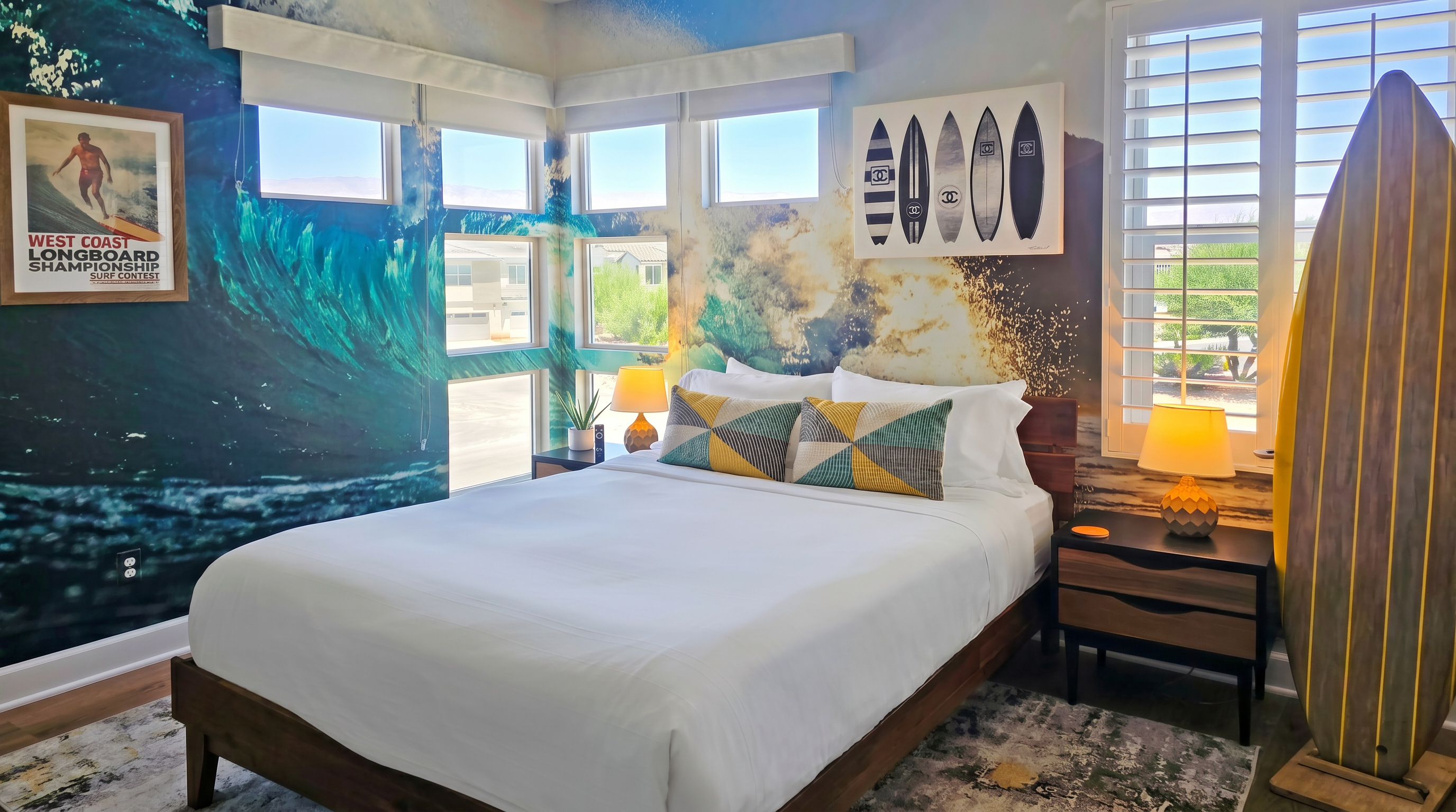 Bedroom #3 showcases tranquil lake views and an ensuite bathroom with a walk-in shower.