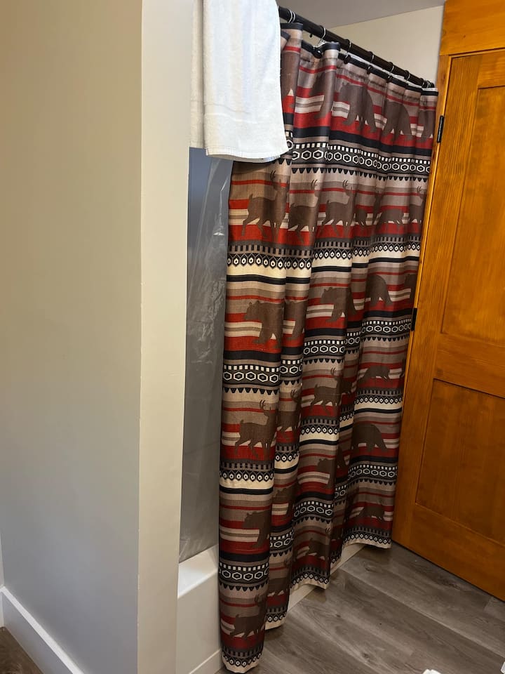 Shower/Tub combo located in Bathroom 2