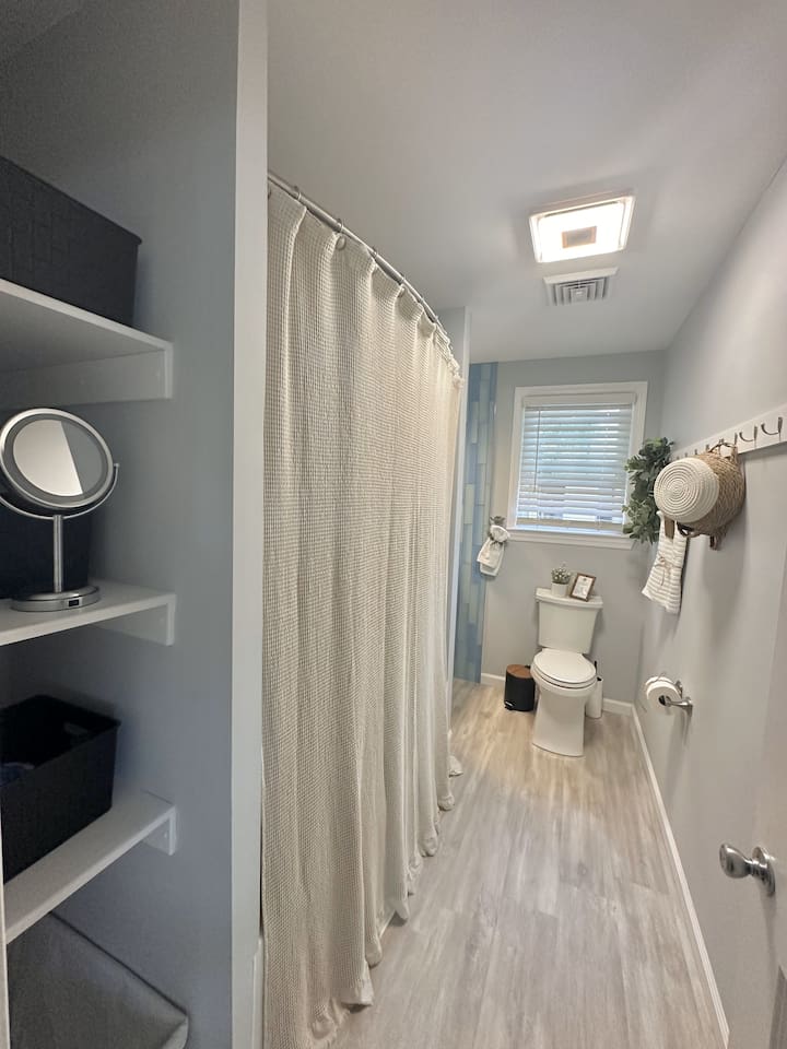 Full Bath with tub shower front of house 