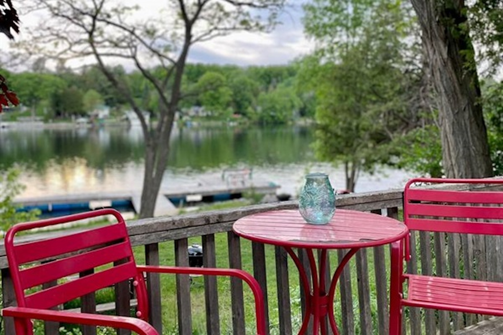 Outdoor dining area with waterfront views