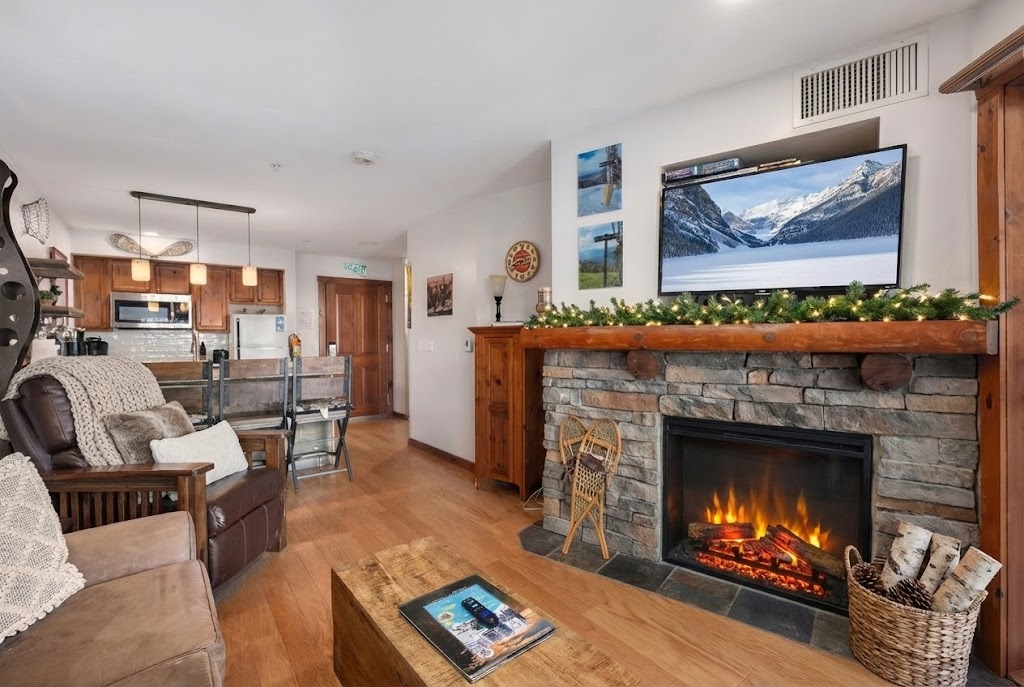 Cozy up by the fireplace.  Guest Review From Christie Benjamin: "Fantastic stay—right in the middle of everything! Super convenient to the ski slopes. The host was incredibly helpful and quick