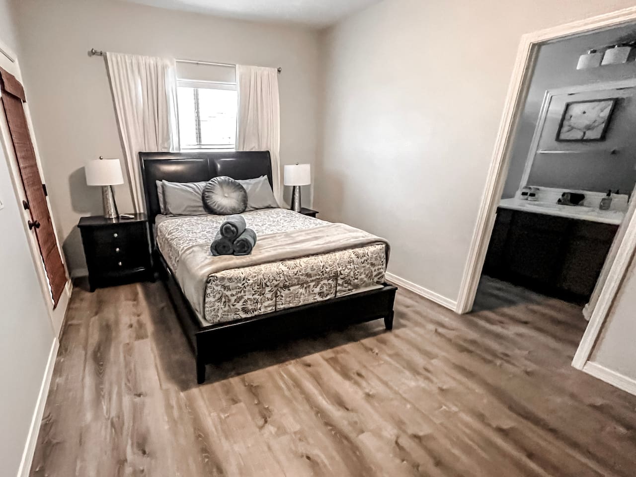 Bedroom #3 with comfortable queen bed and private bathroom