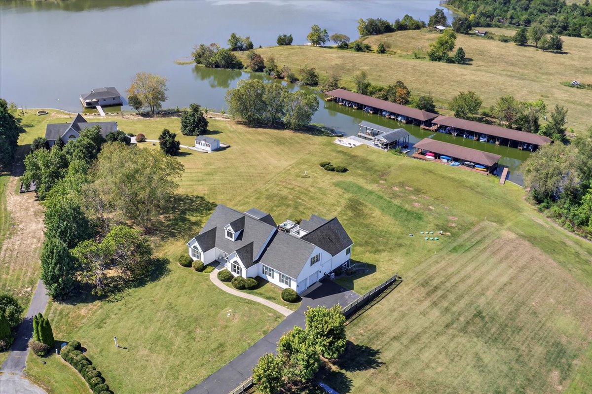 Bird’s-eye perspective of house, beach, and cove.