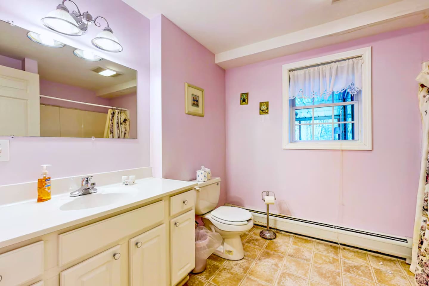 Full bathroom with shower in the basement right off the pool room.
