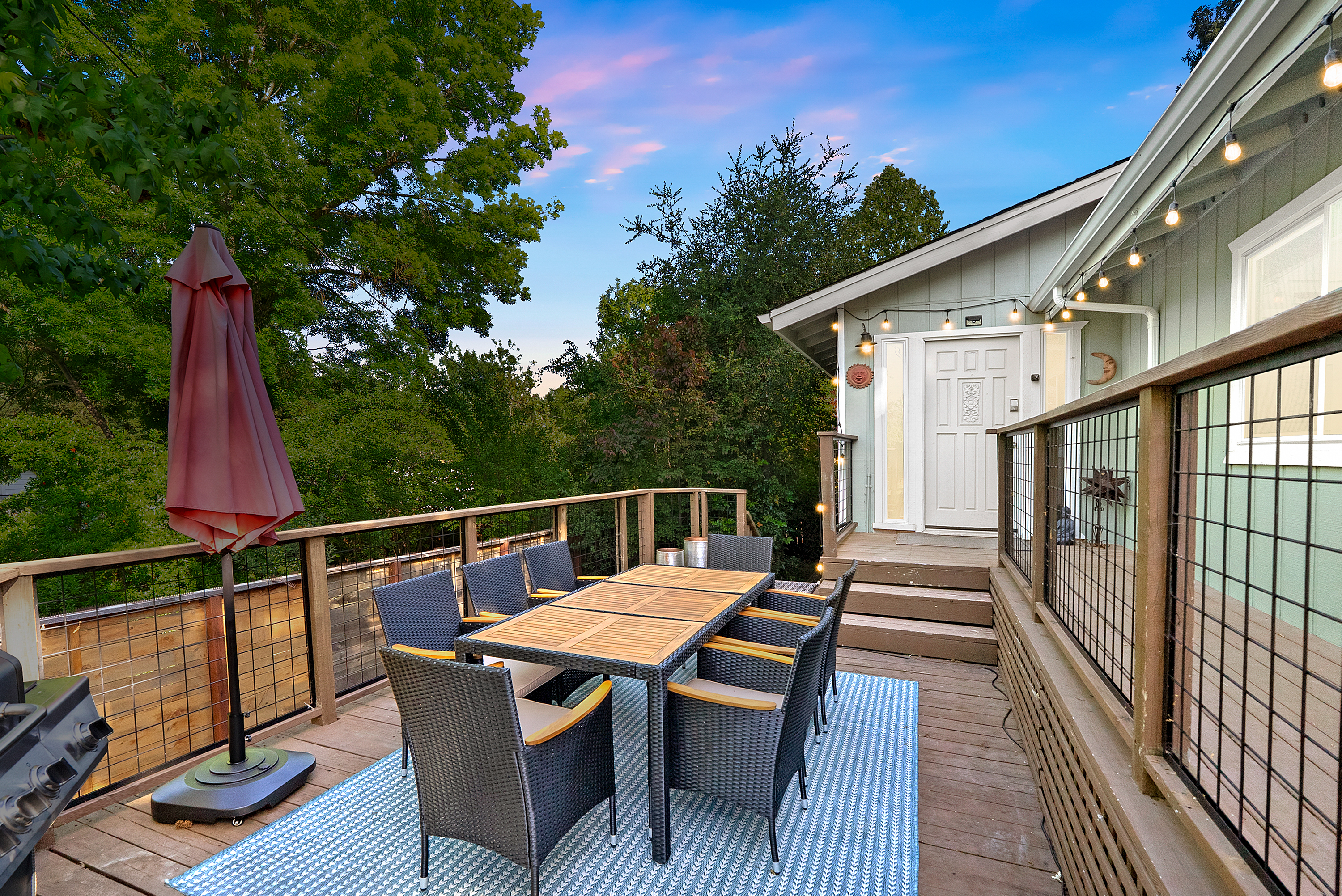 Dine under the stars and string lights on your private deck.