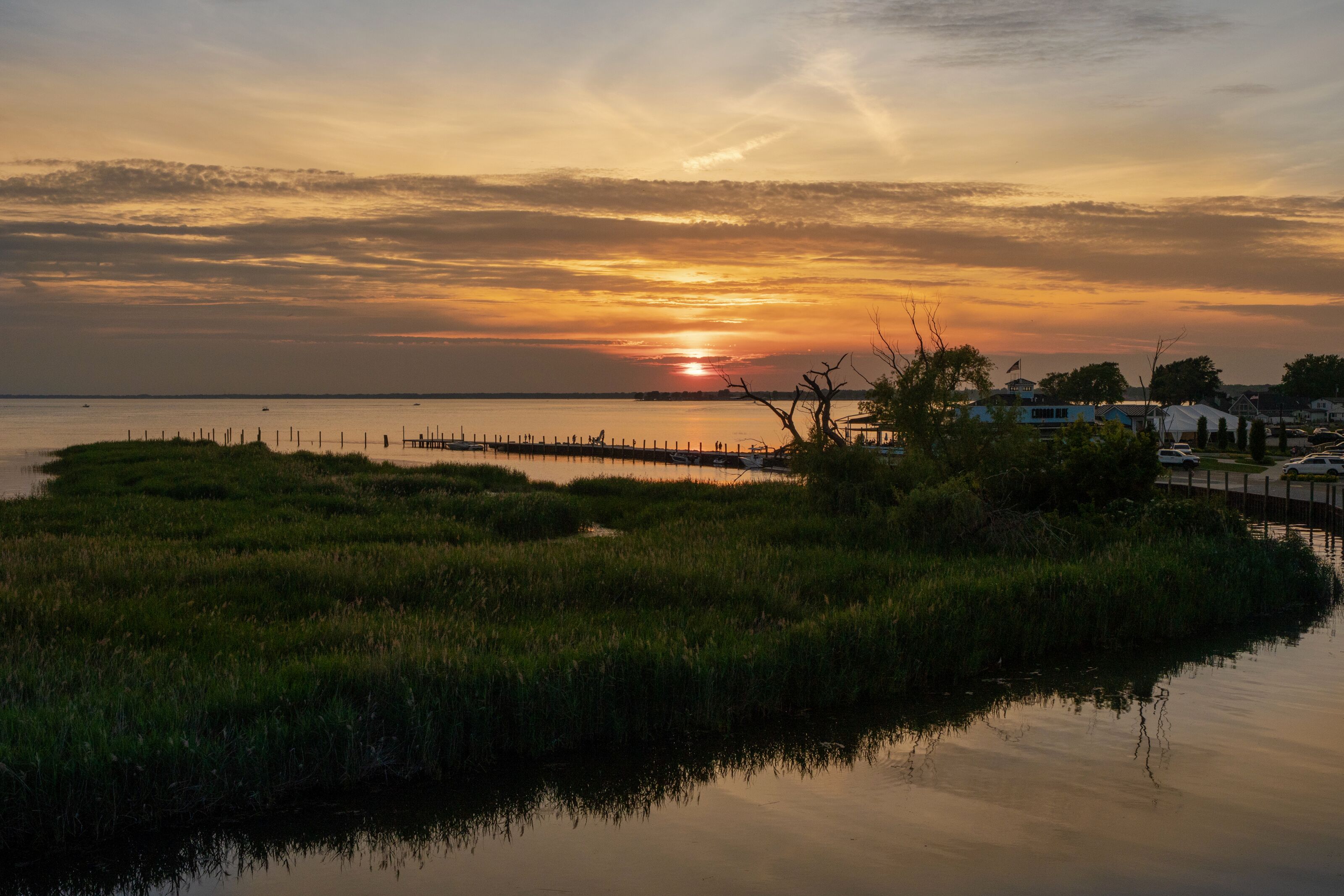 End each day with breathtaking sunsets over Lake St. Clair. Watch the sky come alive with color as the sun sets across the water—an unforgettable view just moments from your stay.