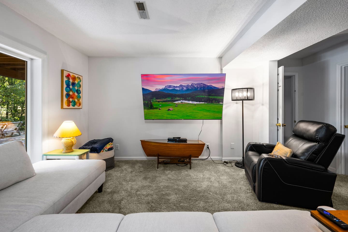 2nd living room located downstairs Infinity Game TableFlat Screen TvPlush Sectional 