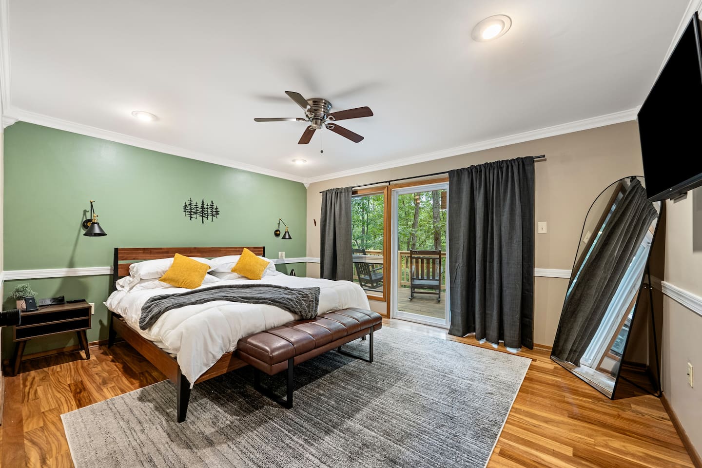 [Bedroom 1] - master bedroom with ensuite full bathroom.  Sliding glass door straight to a separate deck with rocking chairs, perfect for slow mornings.