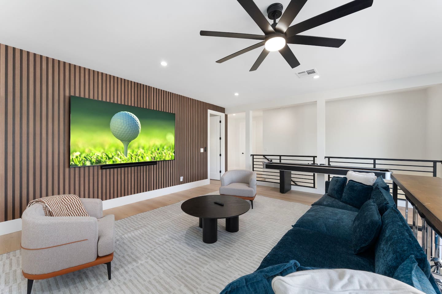 Large flat-screen TV and cozy seating make this loft ideal for movie nights or streaming your favorite shows.