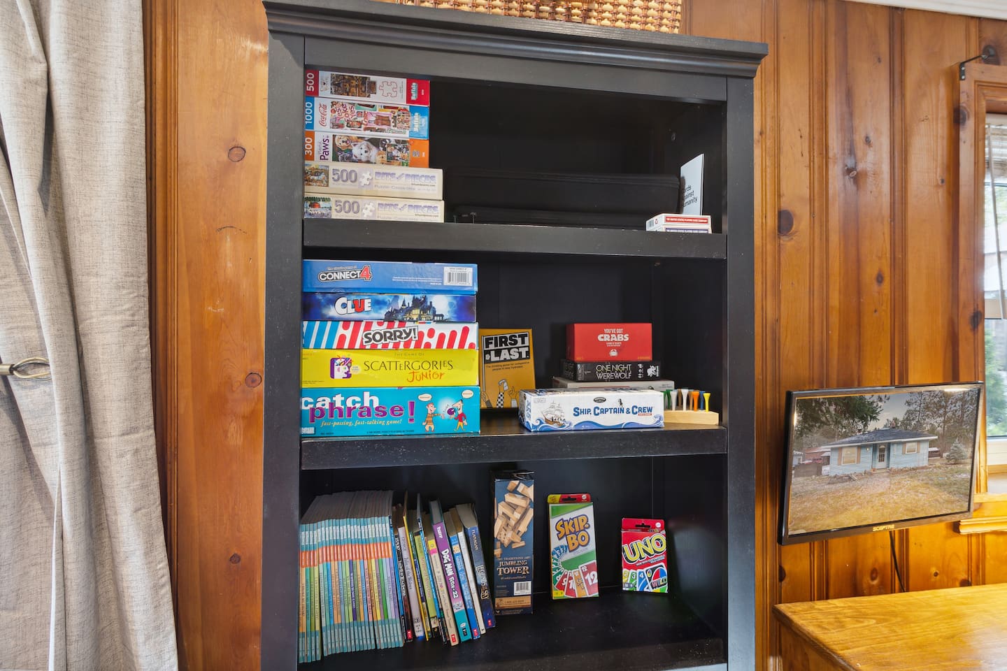 Puzzles, board and card games for use, a lot of our favorites!