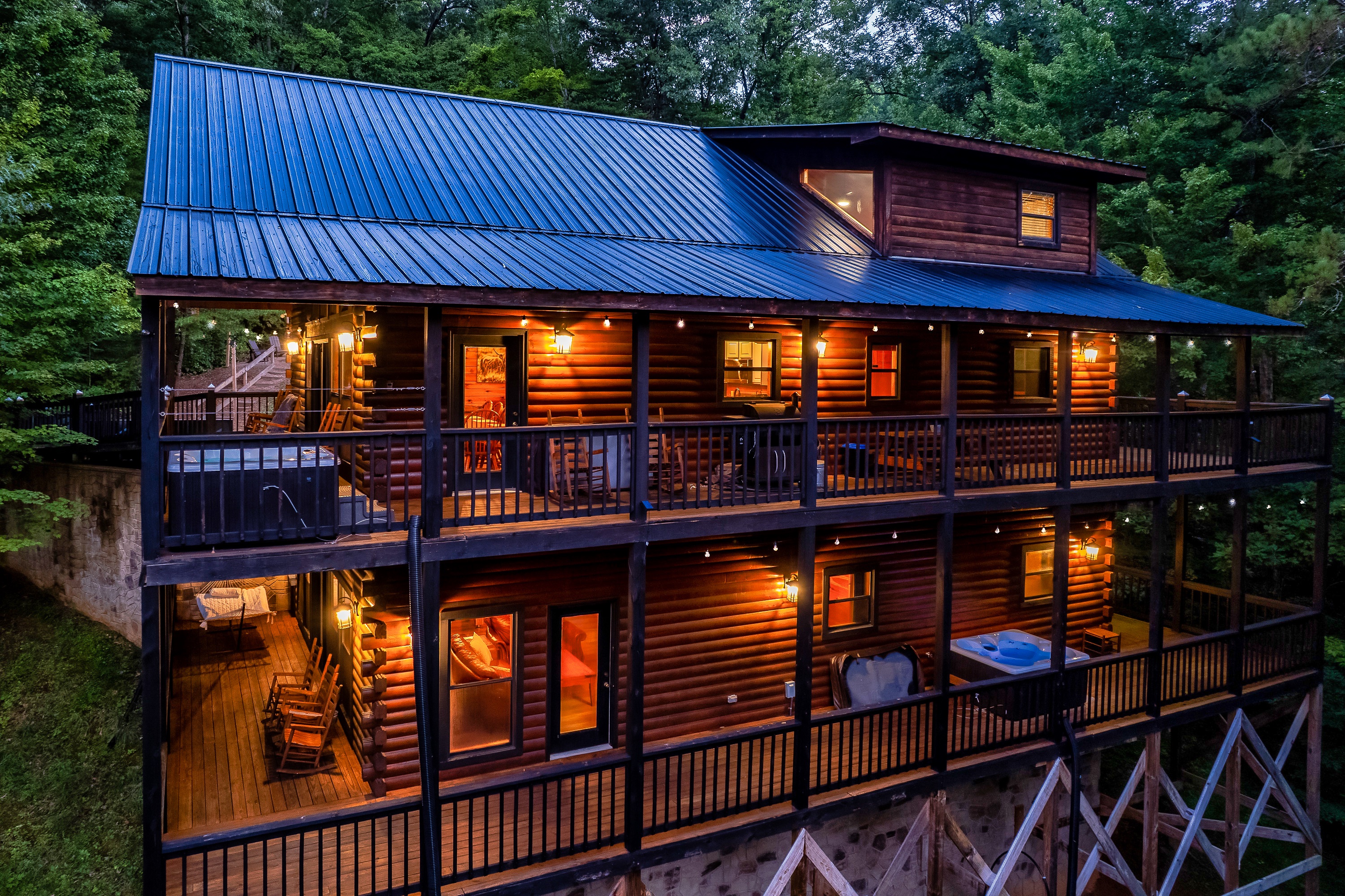 Enjoy the ample deck space for relaxing, connecting and making memories including 2 hot tubs!