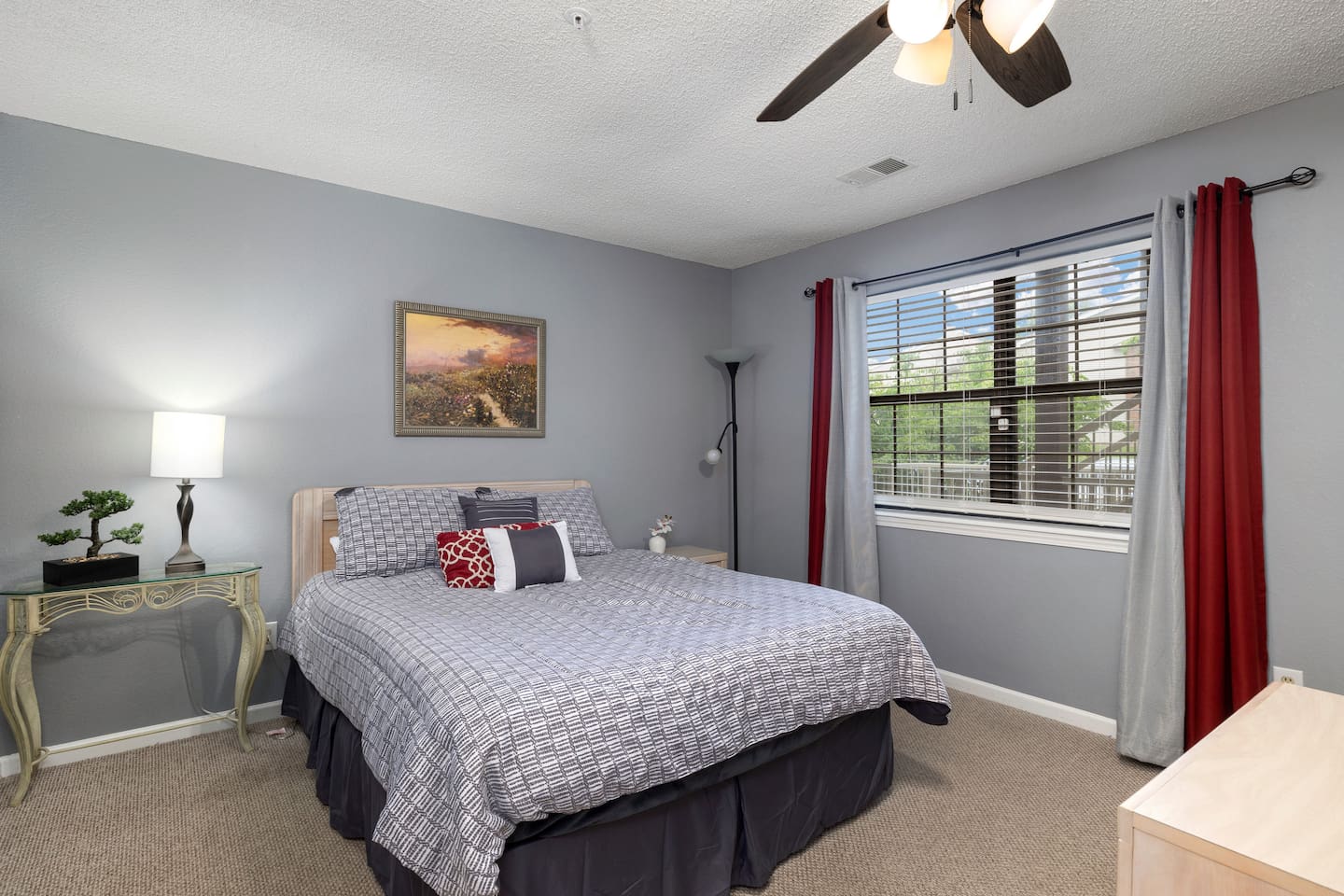 Charming Bedroom: Serenity awaits with inviting decor and natural light for restful nights!