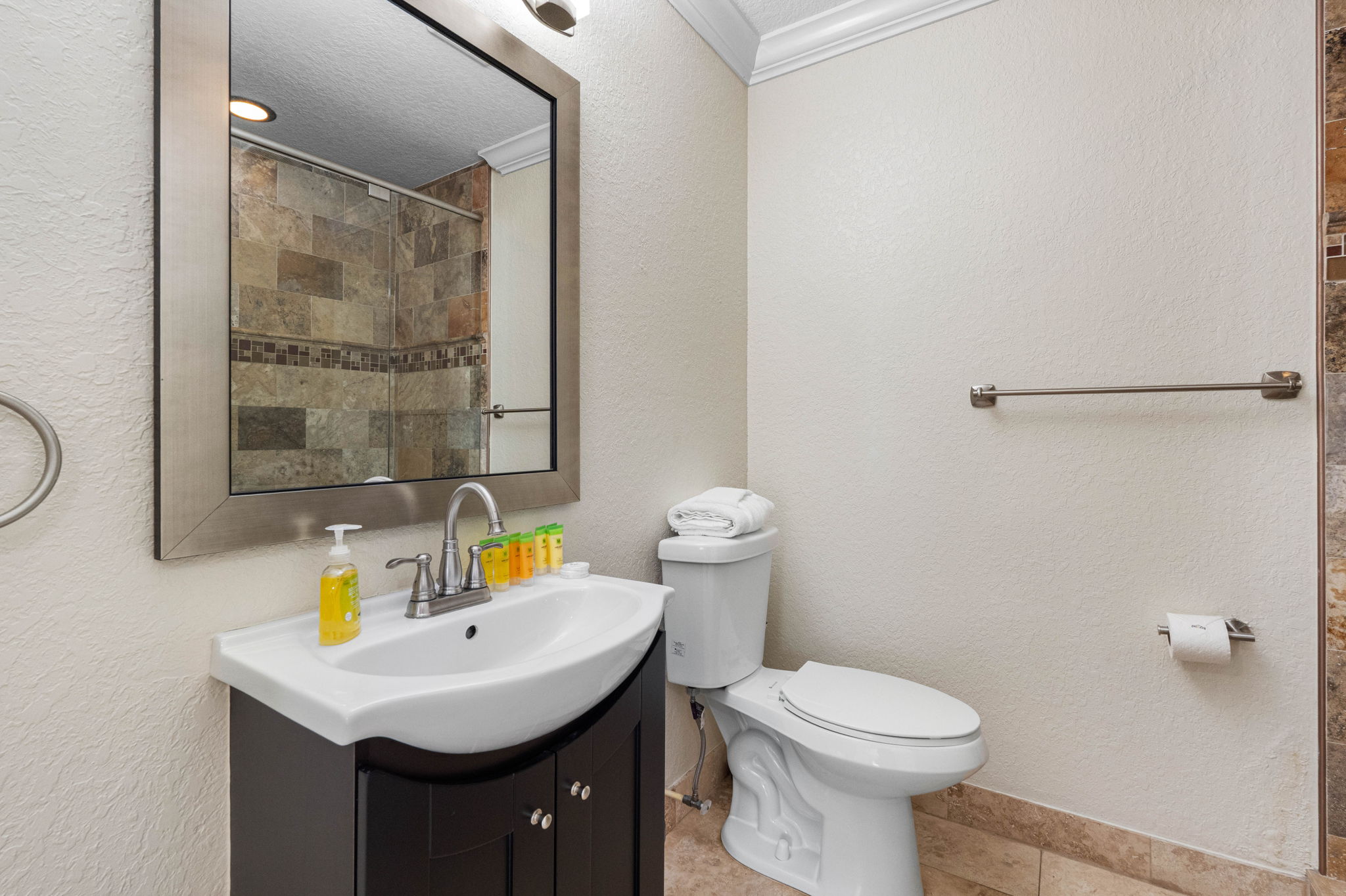 This full bathroom is conveniently located and ideal for shared use.