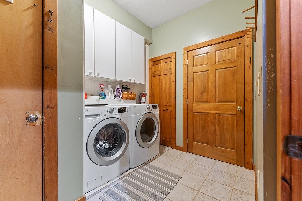 Laundry room with washer and dryer