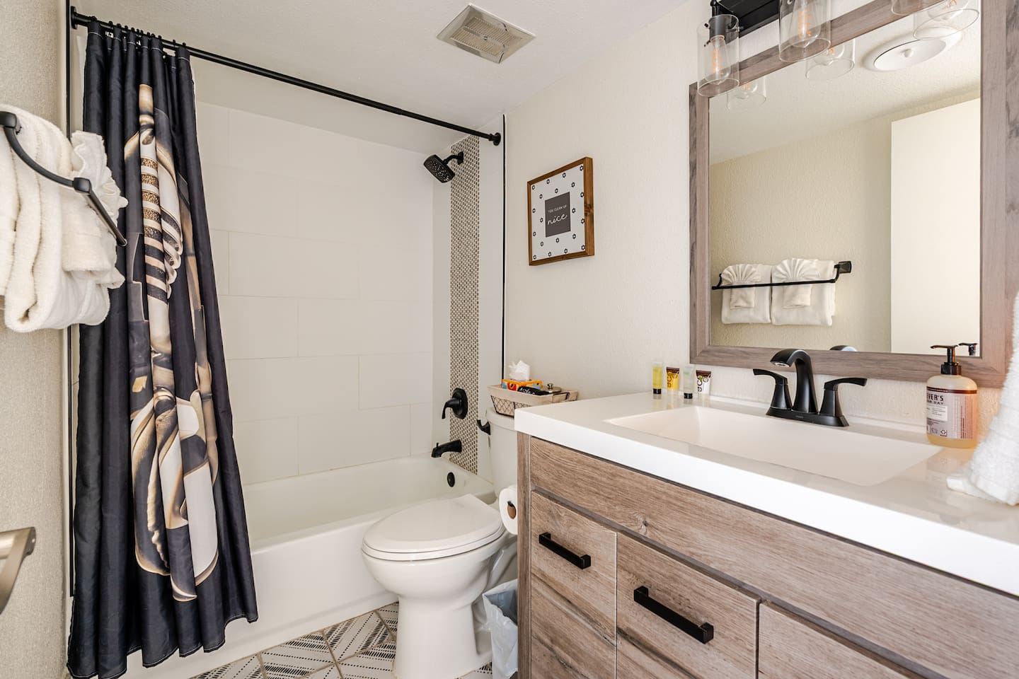Resort like amenities including shampoo, conditioner, soap, body wash, body lotion, Q-Tips, hair dryer, and makeup remover cloths.