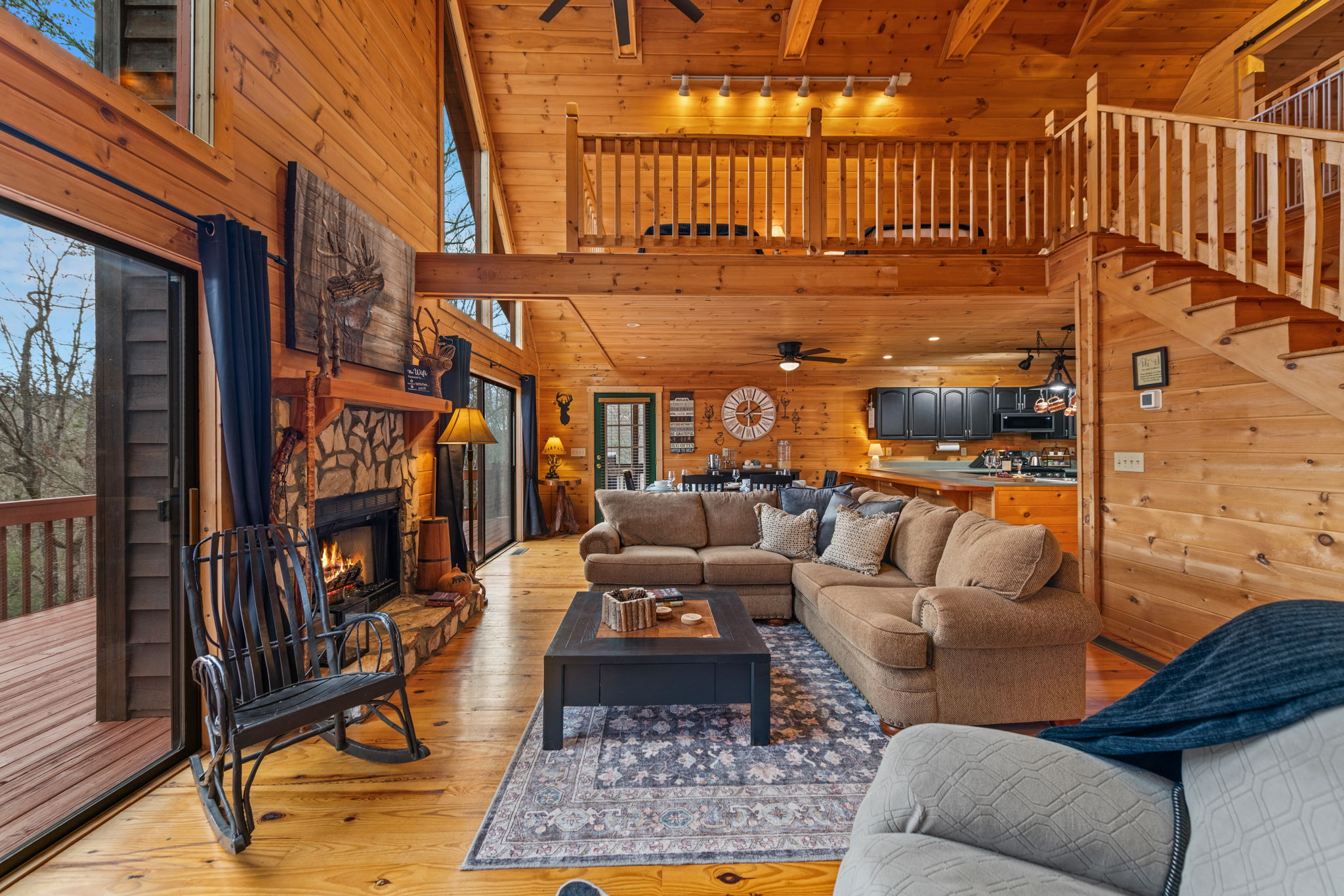 This view highlights the living room’s spacious layout and thoughtful design. 