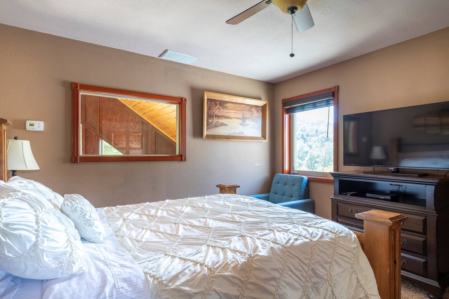 Queen size bed on the second floor