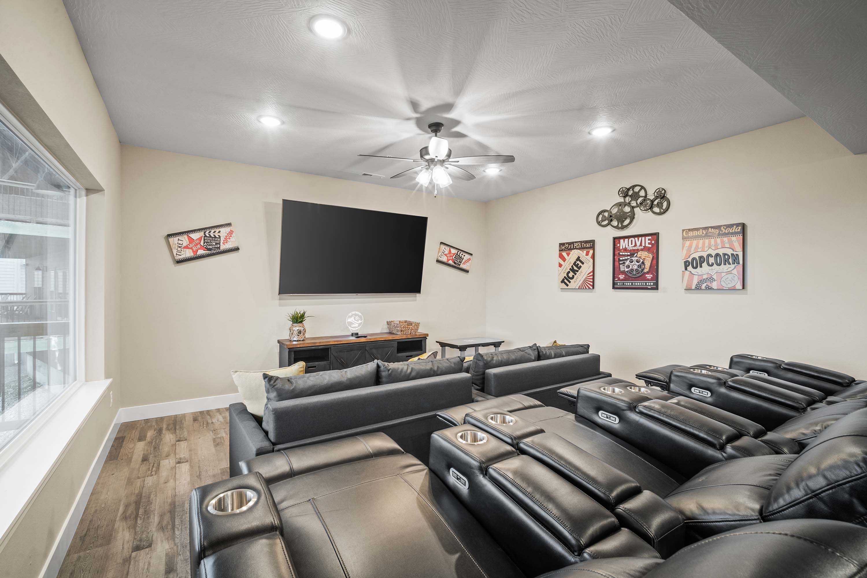 The cabinet under the TV is stocked with books, board games and puzzles.