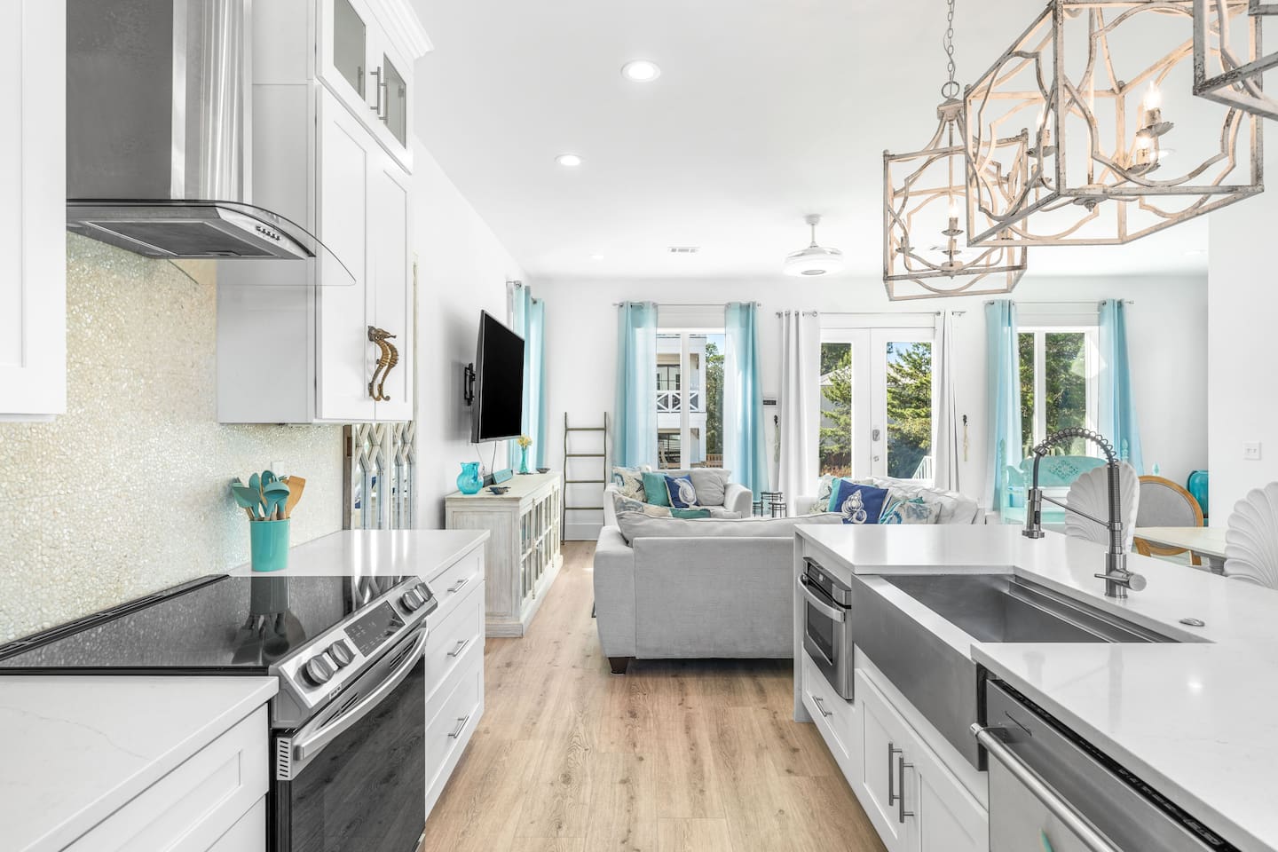 Cook in style!  This 30A open-concept kitchen features high-end appliances, a spacious island for 4, and custom cabinetry. Whether brewing morning coffee or hosting a family feast, it’s the heart of your pristine Blue Mountain Beach home. ✨