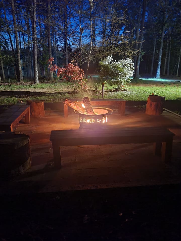 Fire Pit Retreat: Gather around the flickering flames and enjoy starry nights in nature's embrace!