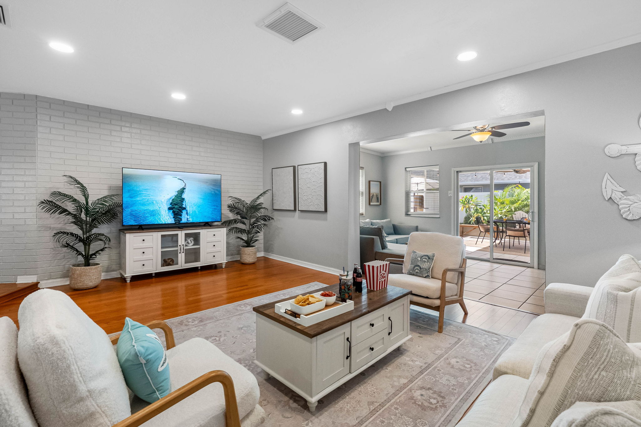Designed with comfort in mind, this living room includes plenty of seating for the whole crew to gather, relax, and reconnect.