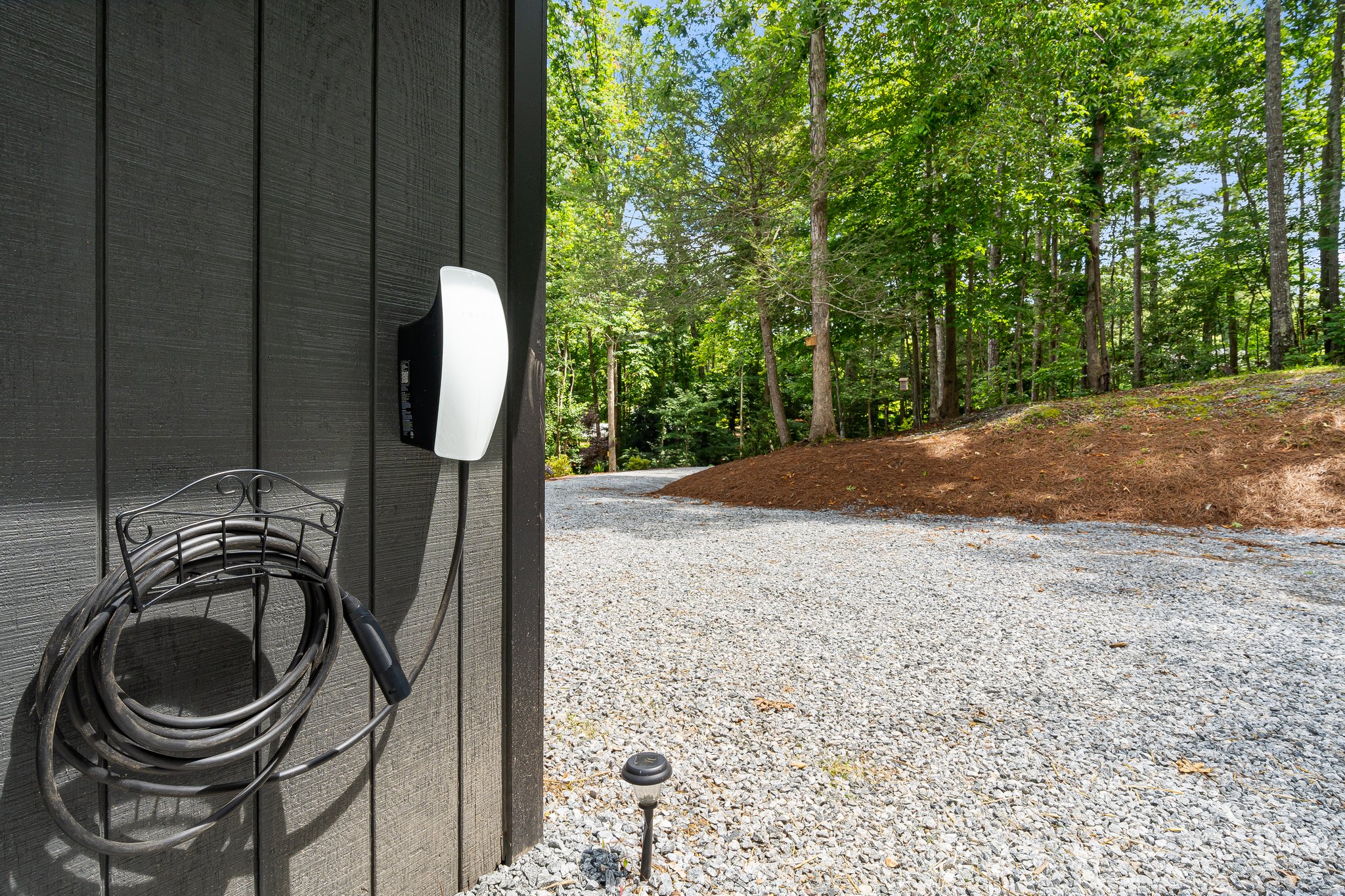 Equipped with a Level 2 EV Charger featuring a dual plug type compatible with all North American EVs.