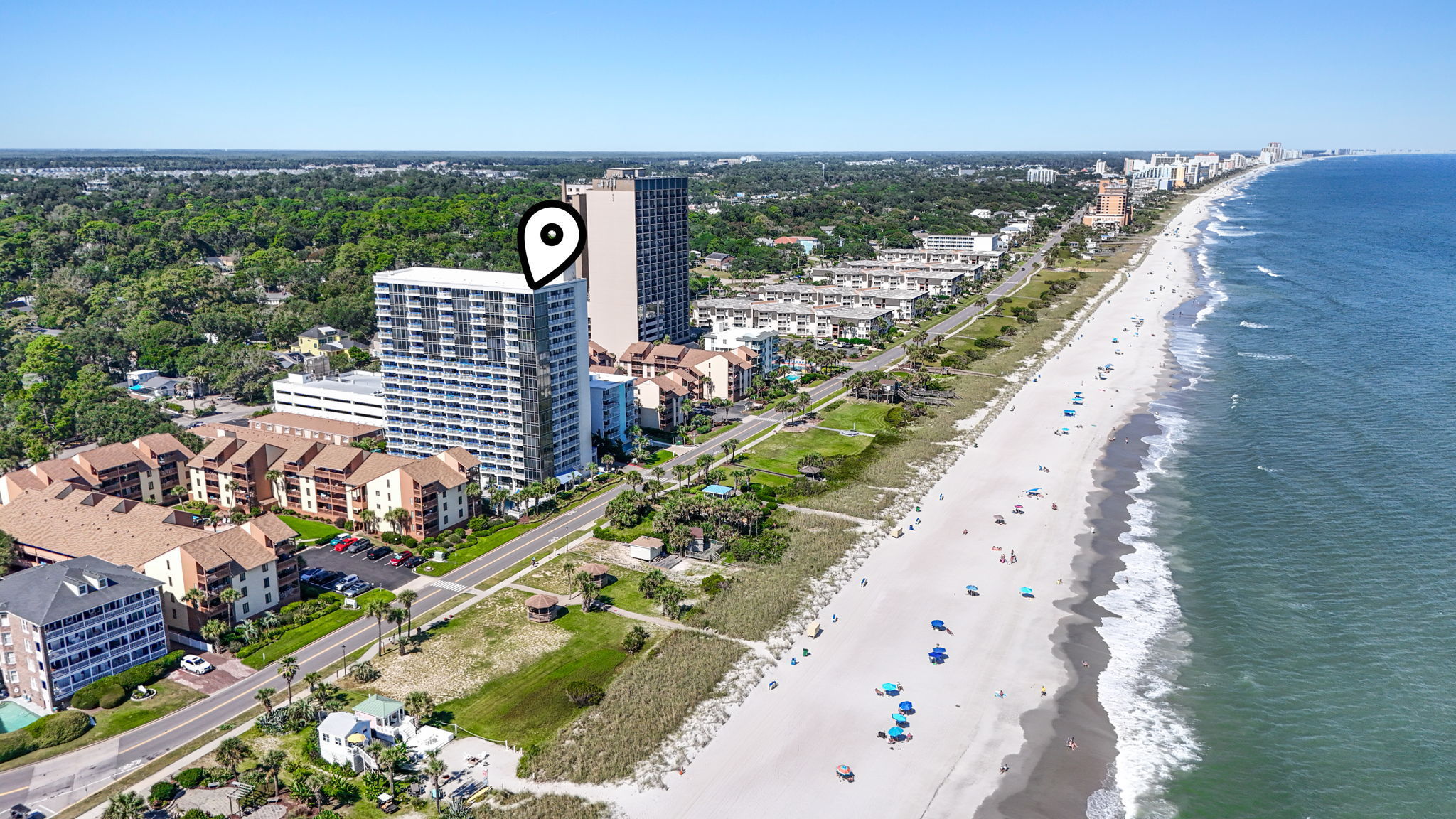Aerial view of Forest Dunes (marked) and the beach
