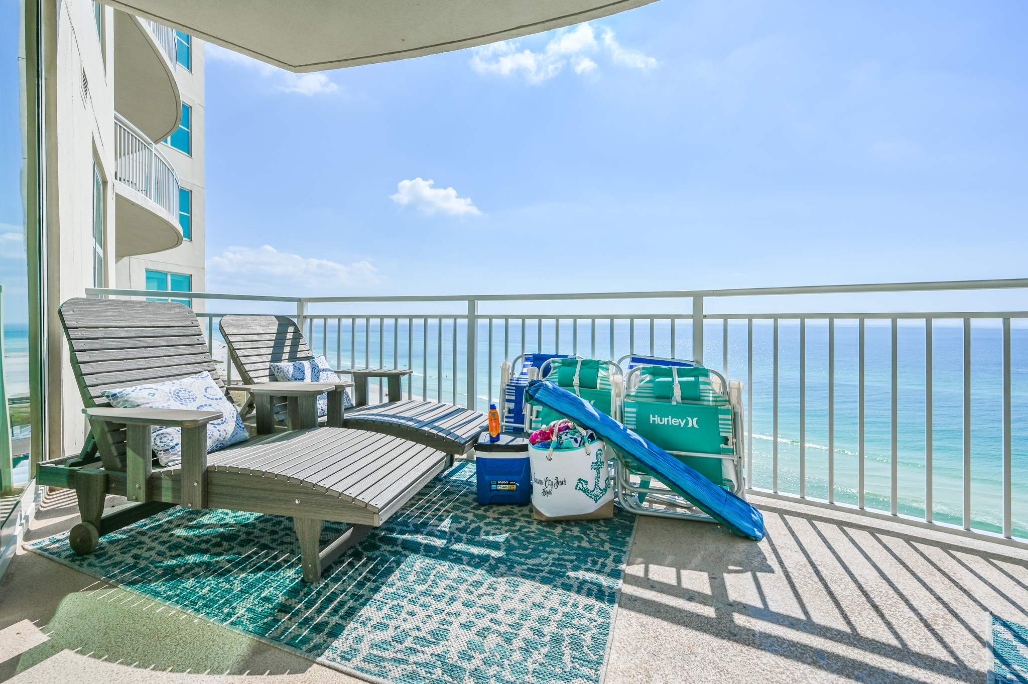 Great Lounge Space on the patio - We provide high quality beach gear and beach towels!