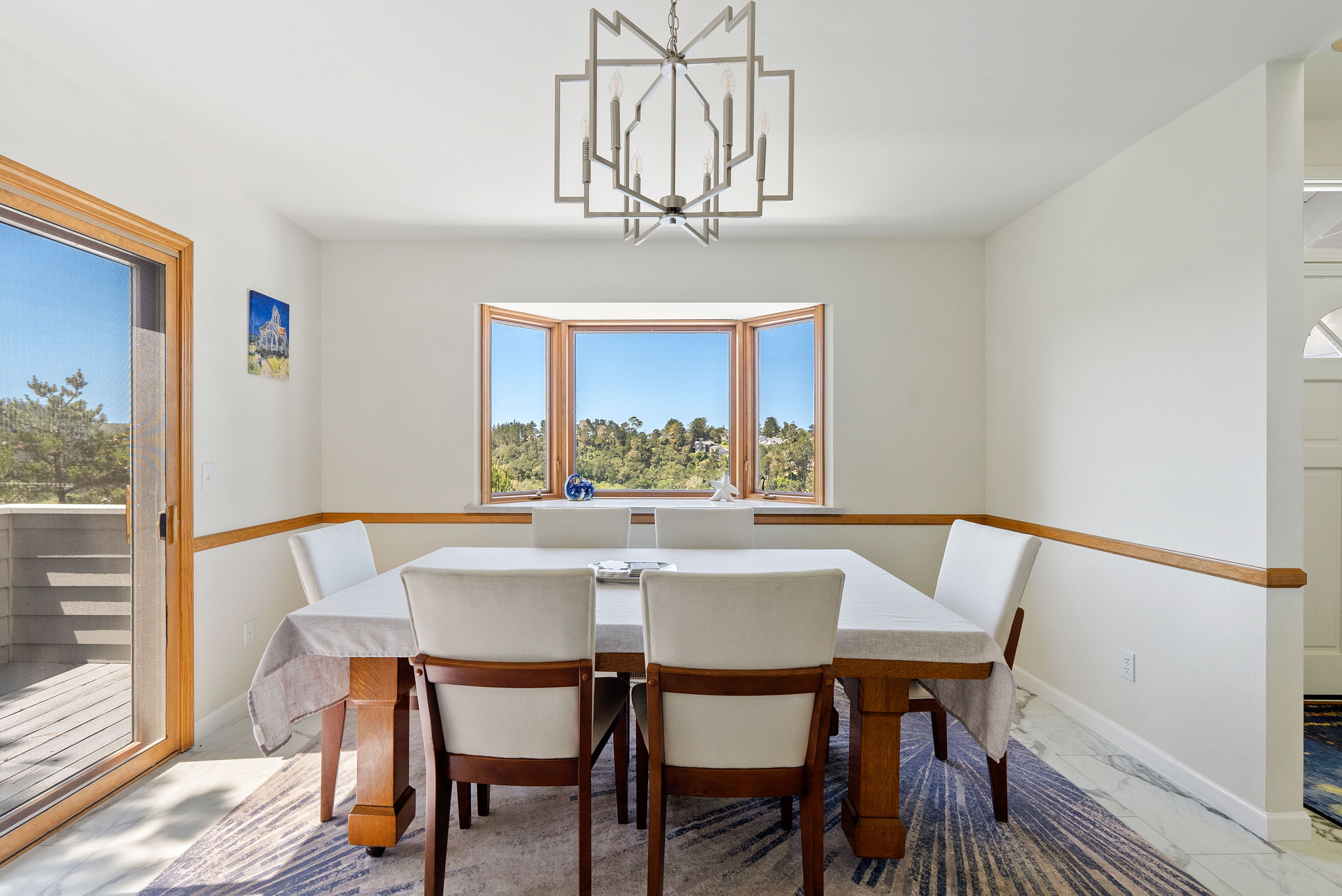 Dine with a view through this stunning coastal bay window.