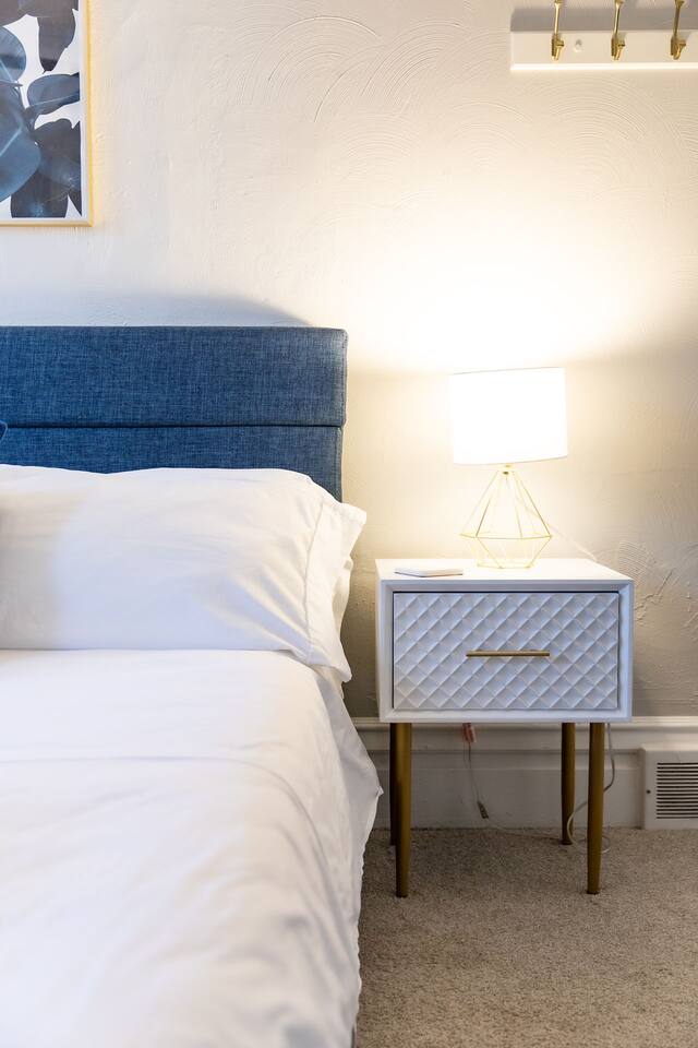 Bed side table and lamp.