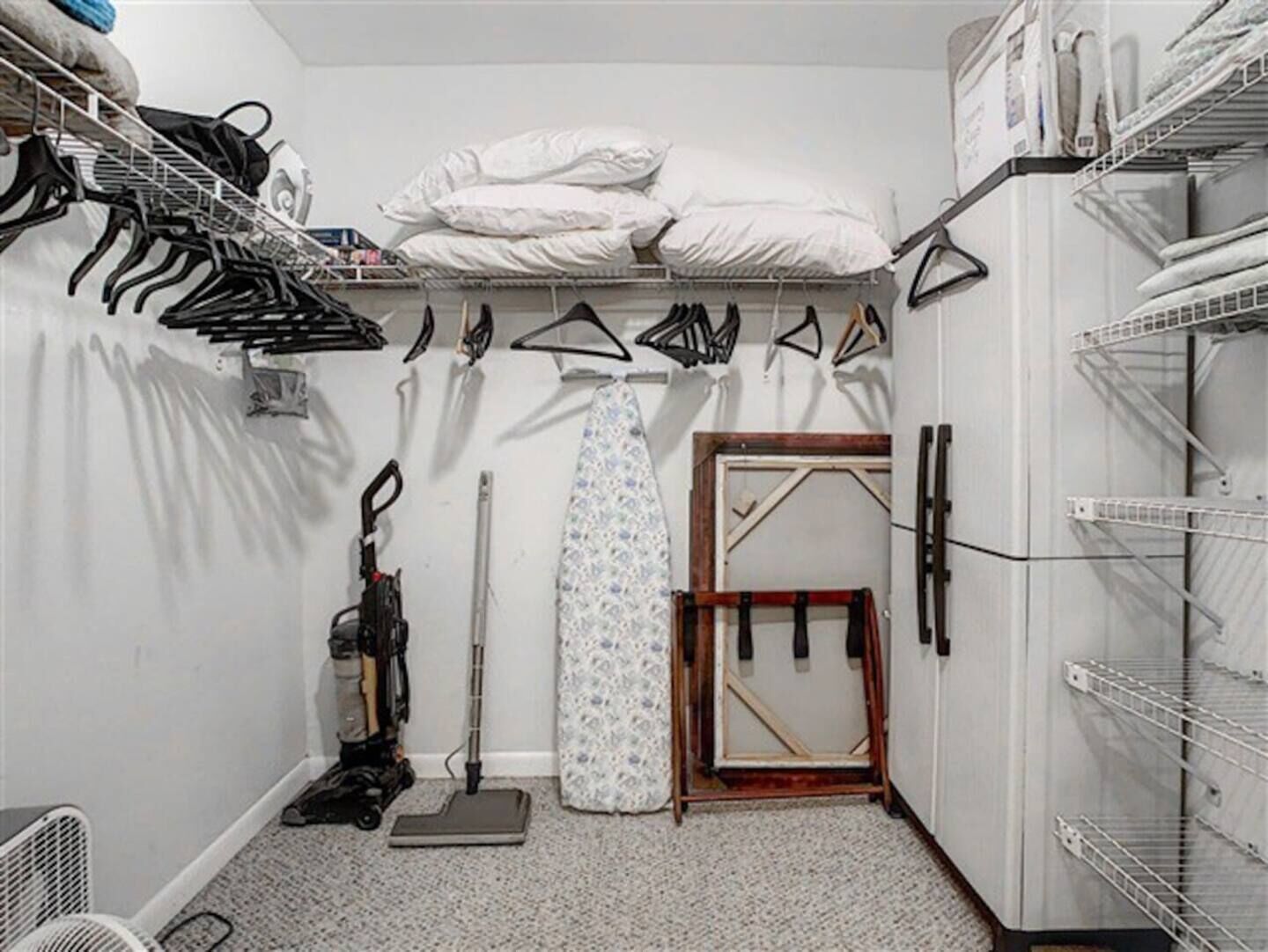 Walk-in Closet storage for clothes and extra luggage