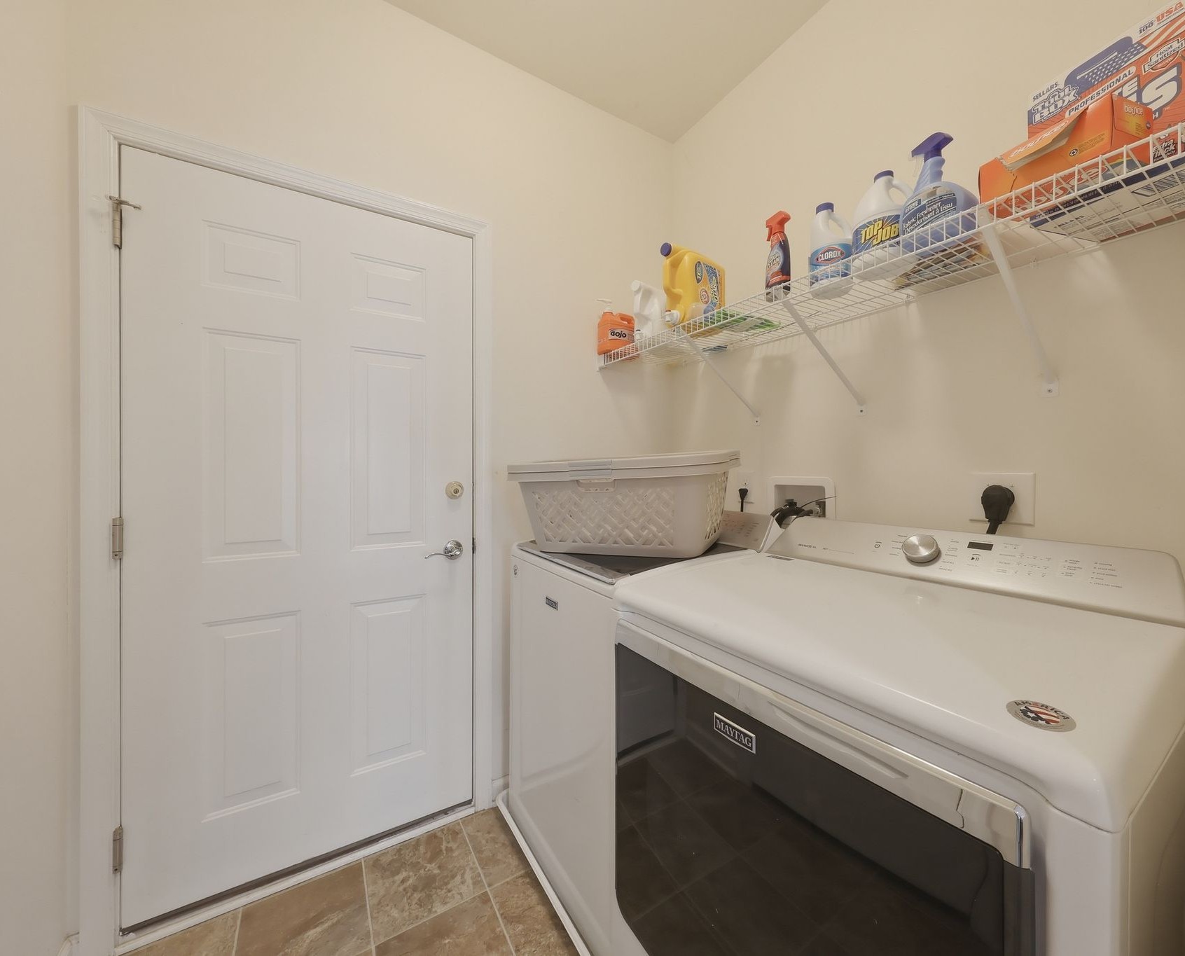 Laundry room with full size washer and dryer, laundry supplies to use what you need