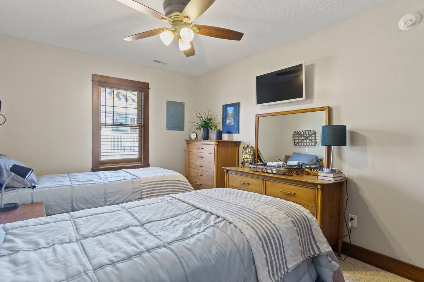 Cozy room with two single beds, offering a comfortable and inviting space for rest.