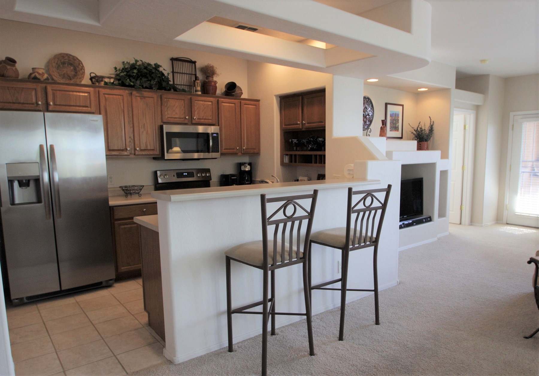 Kitchen offers bar top seating