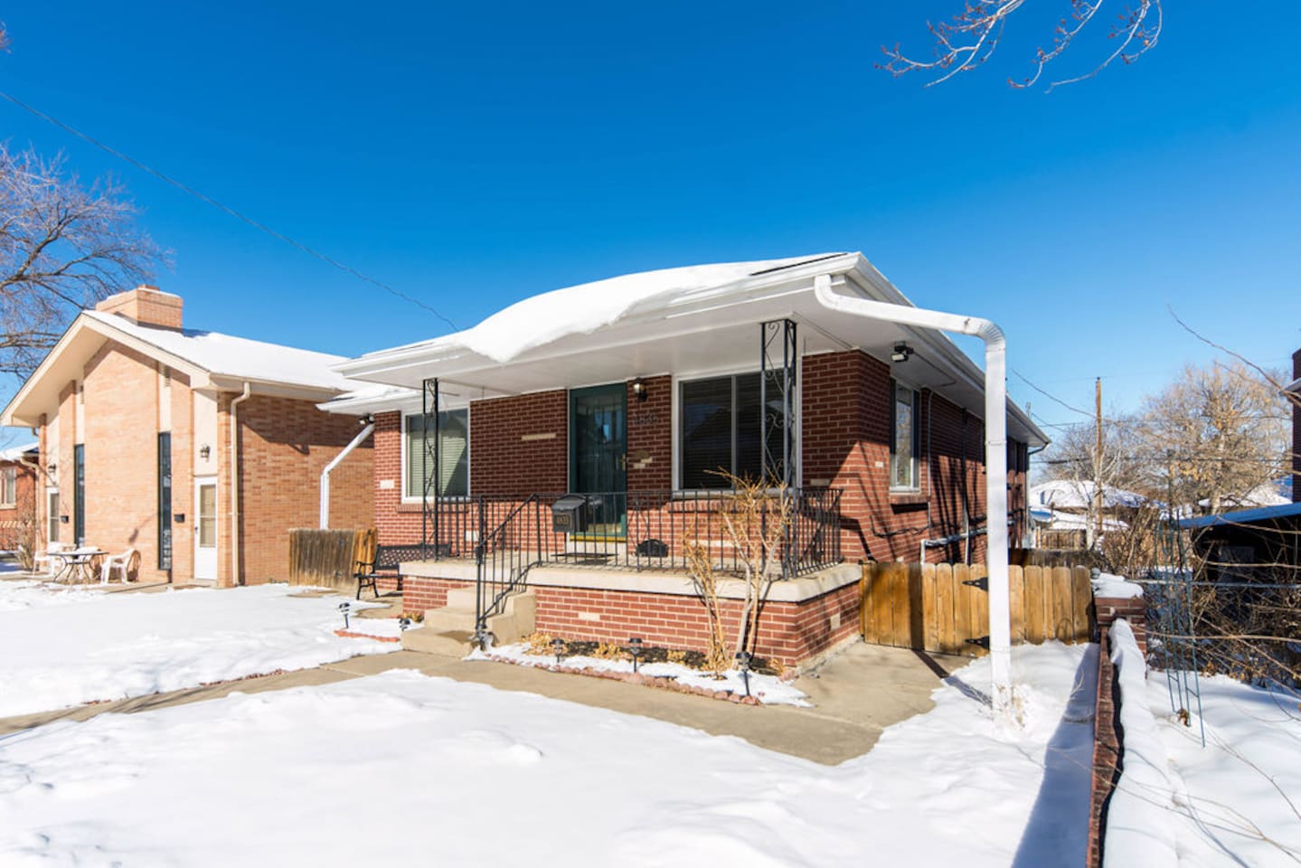 Private entrance to unit is through the side gate by porch and down staircase