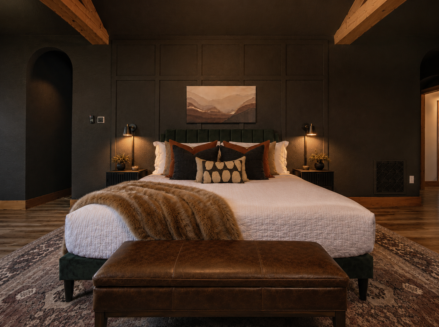 {Master Bedroom} Retreat to a spacious king suite with dramatic wood beams, mountain views, plush layered bedding, and a private ensuite spa bath designed for a relaxing end to the day.