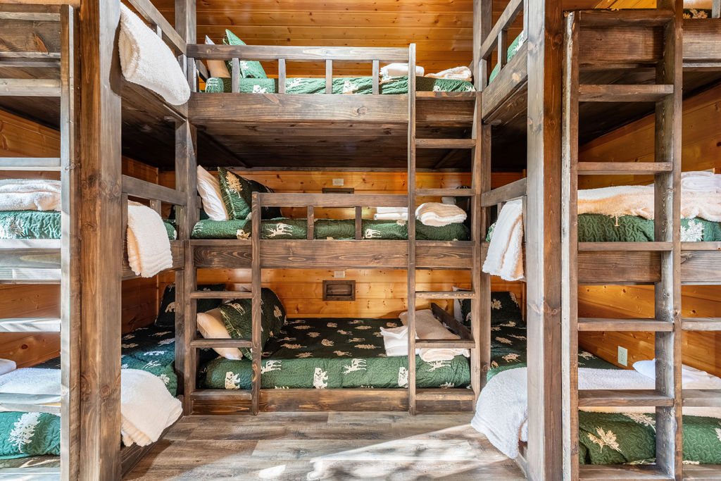 With 2 triple twin bunks and 1 triple full bunk in each bunk room, this level is thoughtfully designed to sleep up to 18 guests&mdash;perfect for large groups or families traveling together.