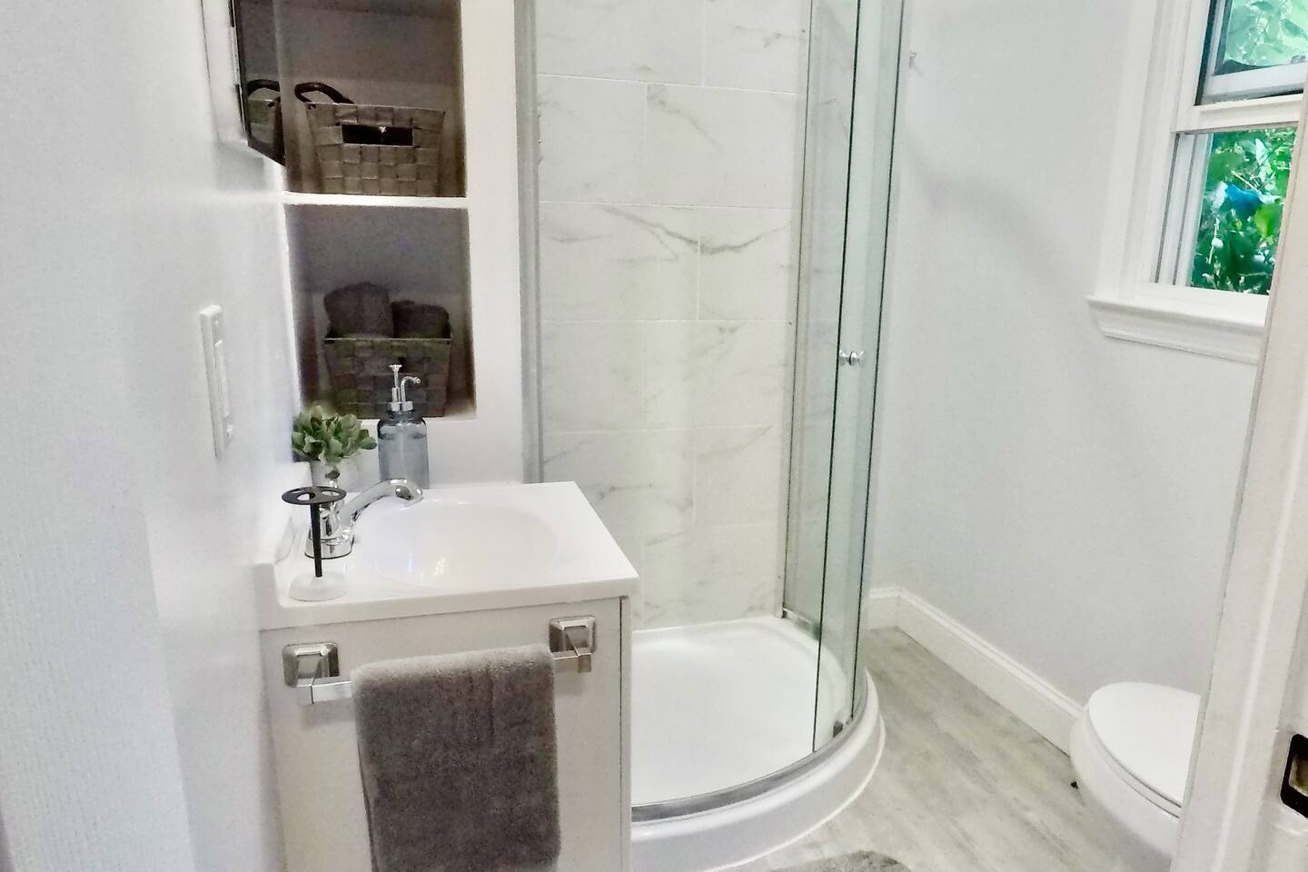 Recently 100% renovated bathroom with new everything! Shower with glass sliding door too!