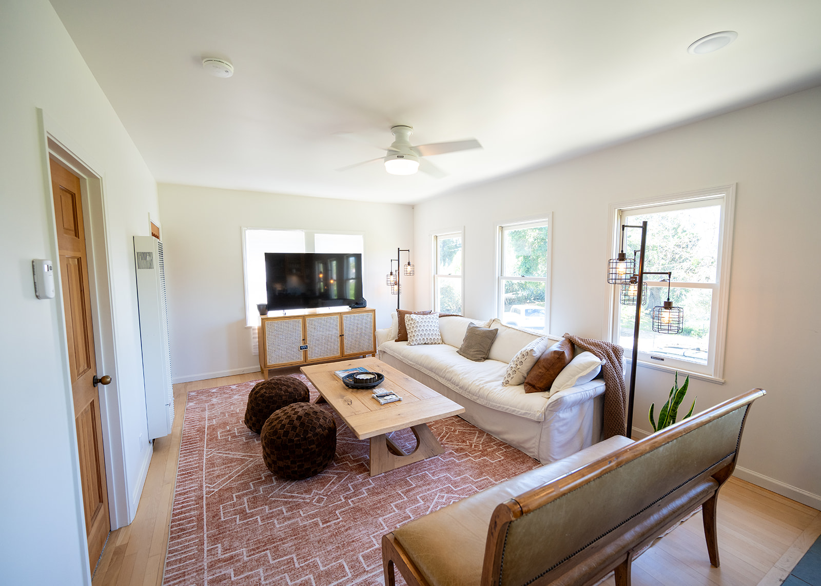 Bright and comfortable living space designed for relaxing after a day in Napa. Smart TV and large sofa couch and bench. Board games included for a night in. 