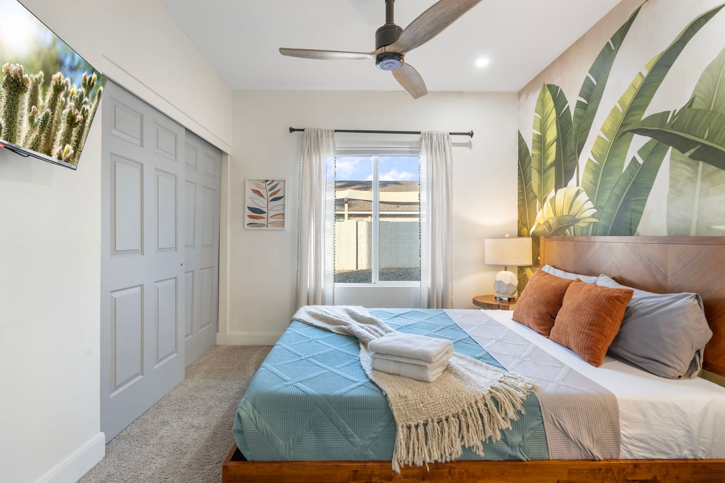 Bright guest bedroom with tropical botanical touches.