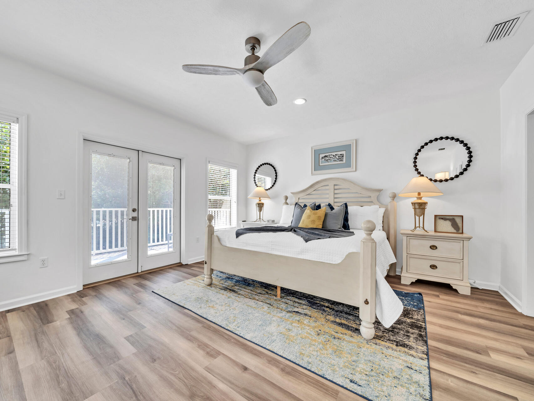 Quiet downstairs primary bedroom with private balcony and ensuite bath