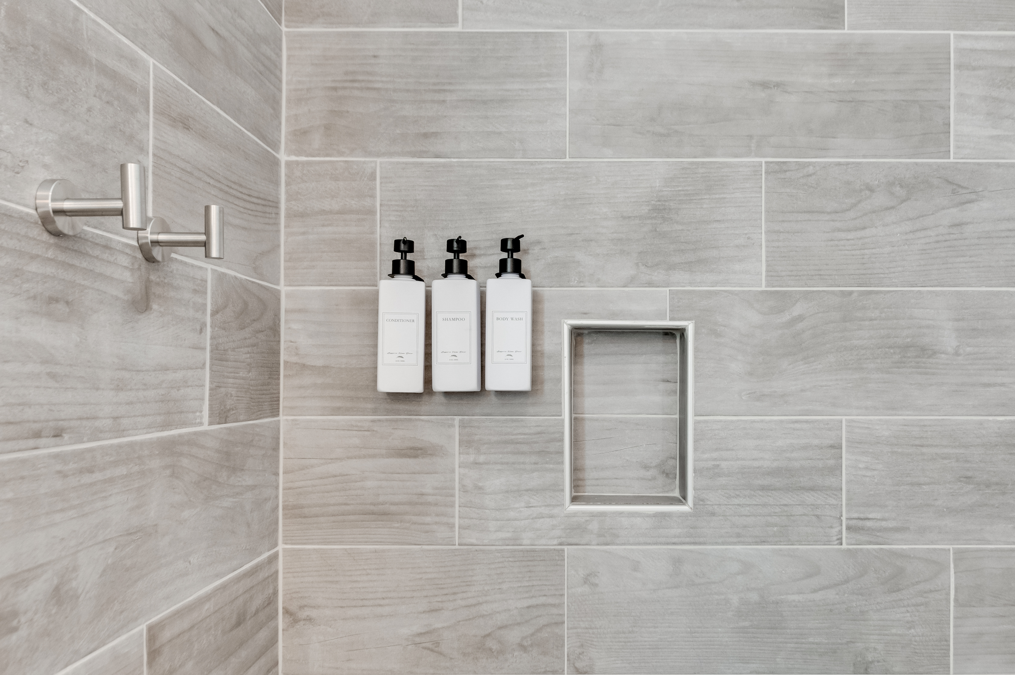 Ensuite Bathroom 2: Refresh with stylish fixtures and premium toiletries in a serene setting!