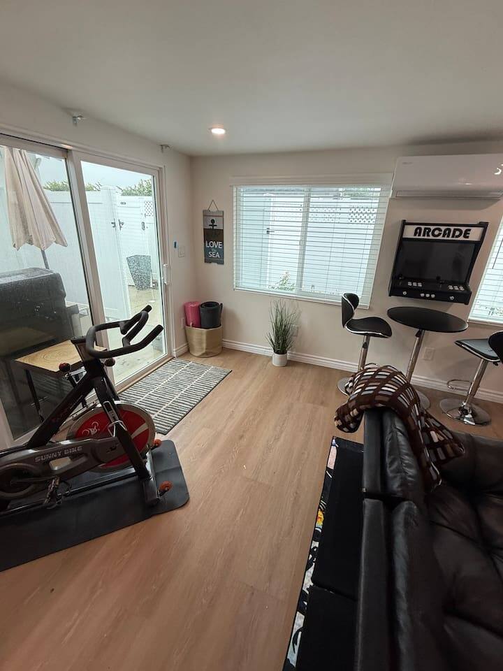 Exercise Bike & Arcade - Slider to Outdoor Patio