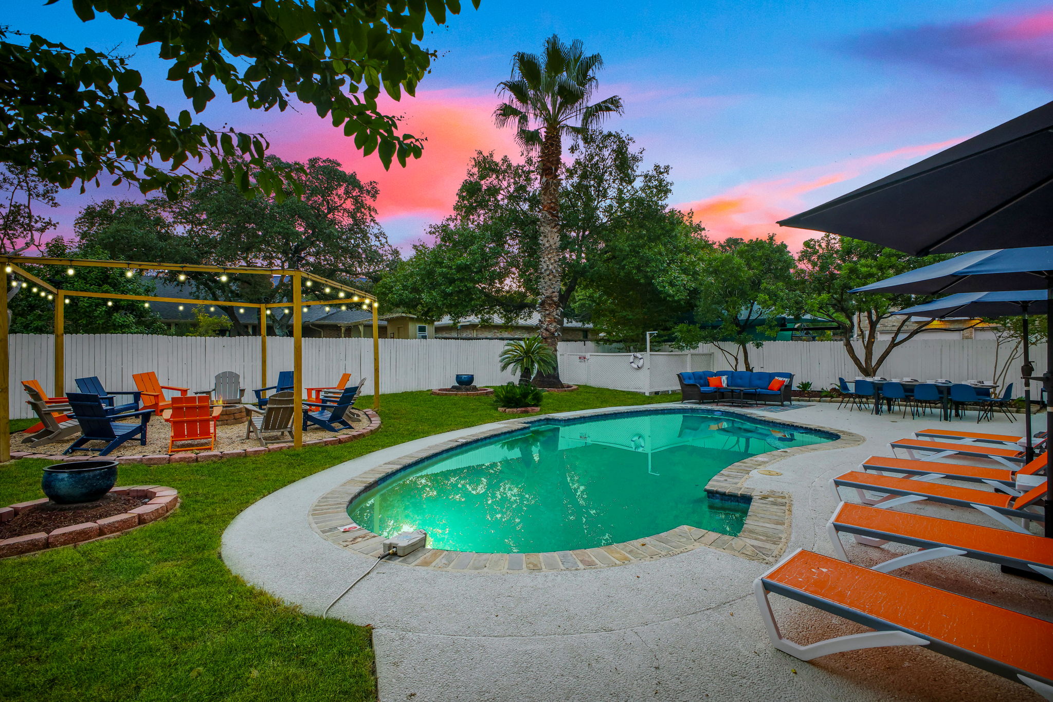 Your private backyard oasis combines comfort, style, and plenty of space for the whole group.