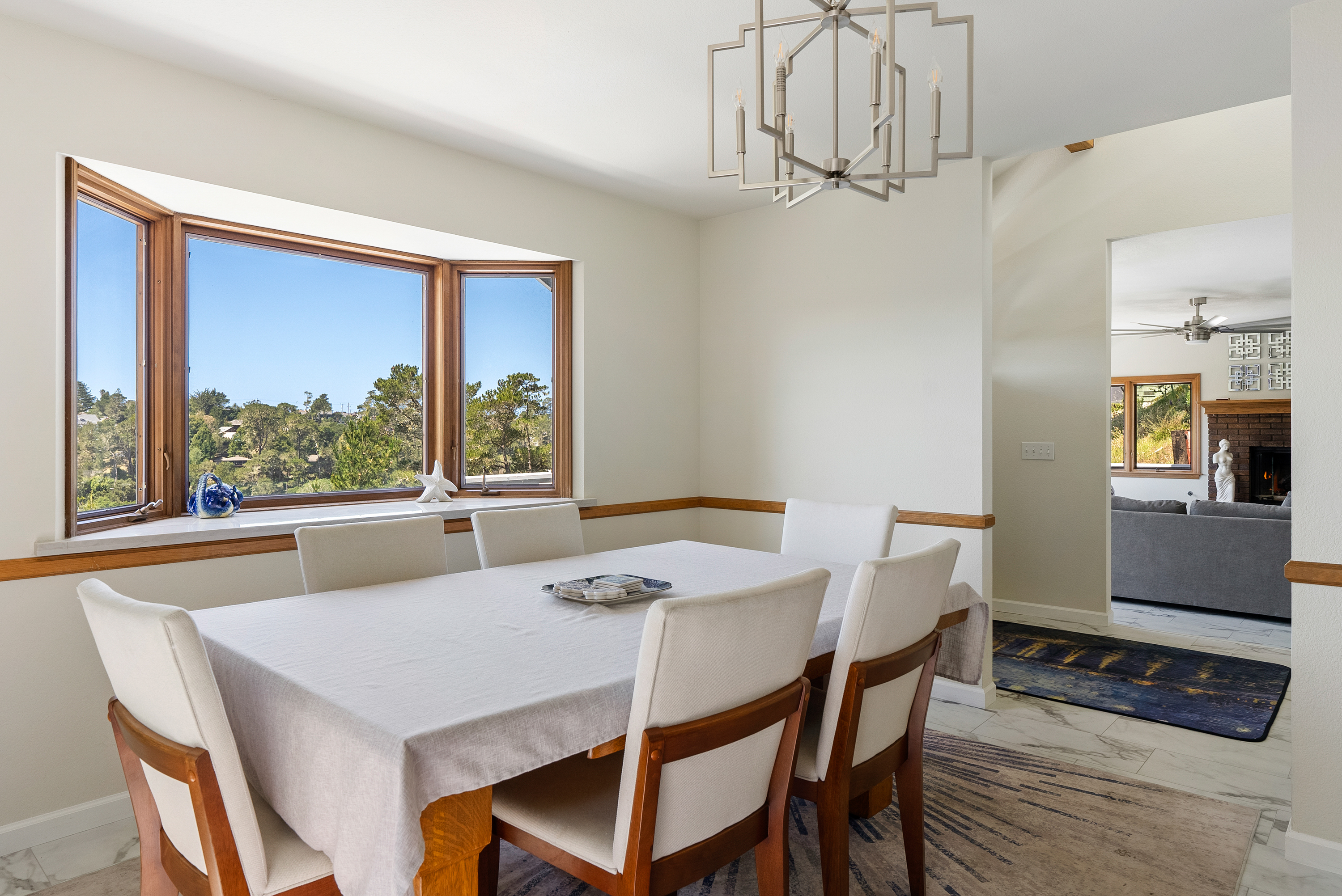 Enjoy a morning coffee with a backdrop of green hills and blue horizons.