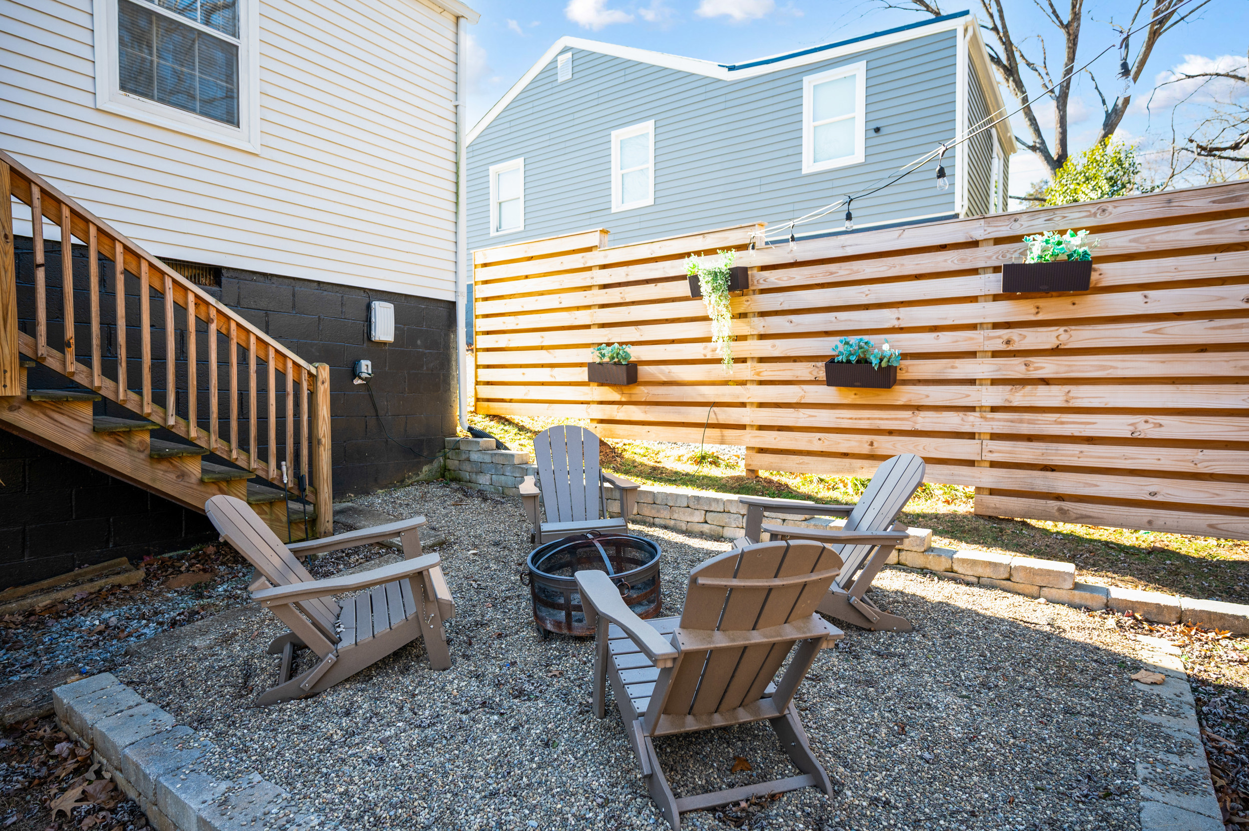 Fire pit with string lights.