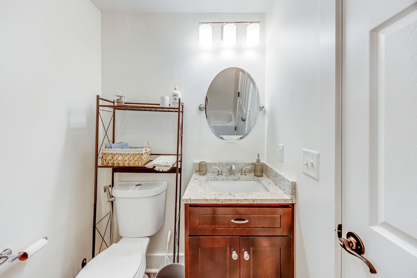 Bright and modern full bathroom, featuring sleek fixtures and all the amenities needed for a relaxing and refreshing experience.